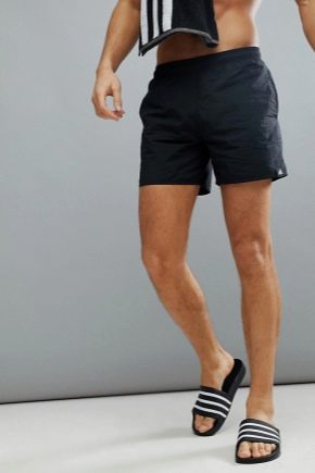 กางเกงขาสั้นผู้ชาย Adidas: พันธุ์และเคล็ดลับในการเลือก