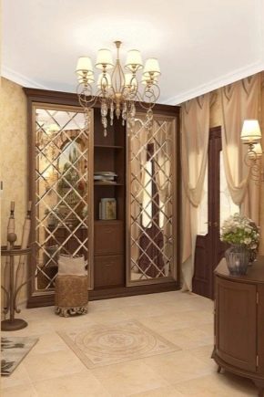 Sliding wardrobes with a mirror in the hallway