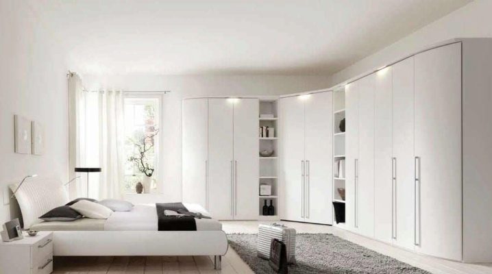 White wardrobes in the bedroom interior