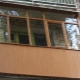 Wooden glazing of balconies and loggias