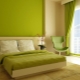 Bahagian dalam bilik tidur dalam warna hijau