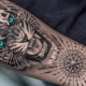Преглед на татуировките на мъжки тигри и тяхното поставяне