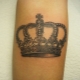 Видове мъжки татуировки с корона и тяхното поставяне